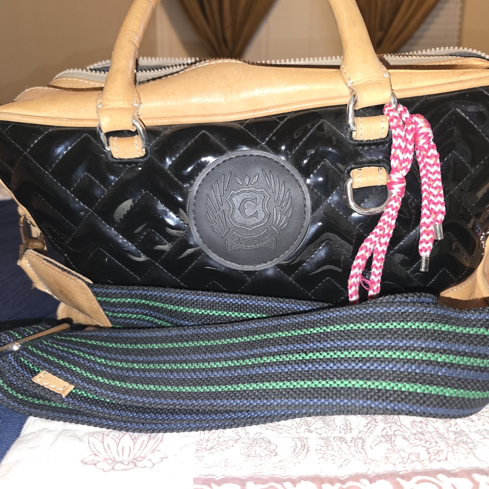 Consuela Black and Tan Travel Bag with Structured Design